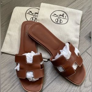 Hermes Oran Sandals in Gold size 37
